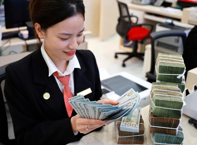 Giá USD giảm mạnh, doanh nghiệp thở phào- Ảnh 1.